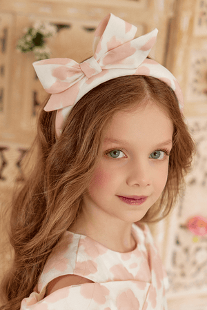 Blush pink organza headband with a bow