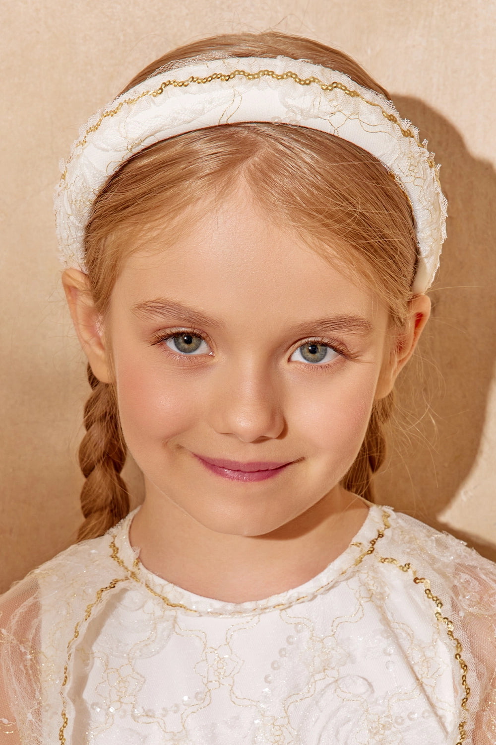 Ivory padded headband with gold lace detailing