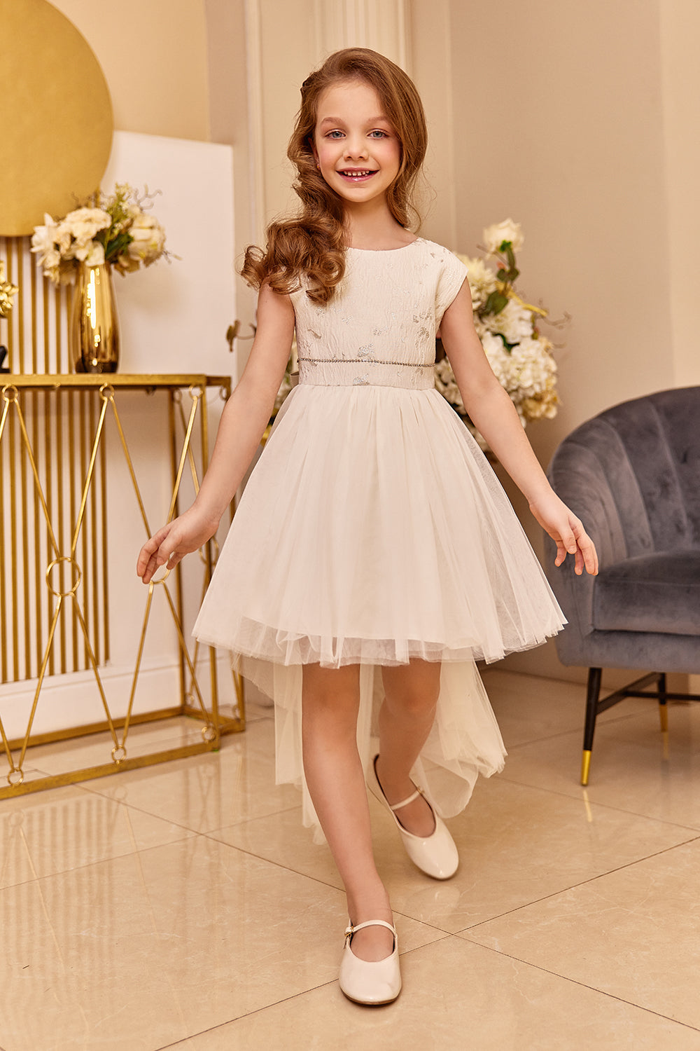 White tulle dress with stone decorated belt