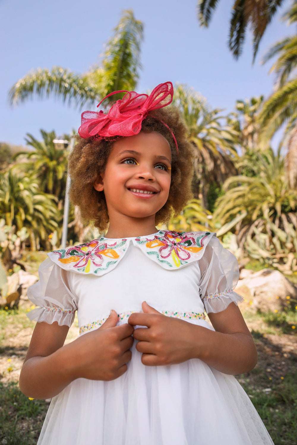 White tulle dress with hand-embellished collar and waistband