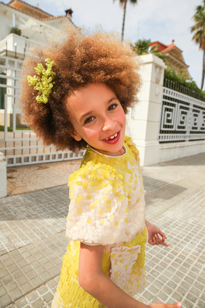 Yellow and ecru sequin dress with puffed sleeves and big pockets with frills