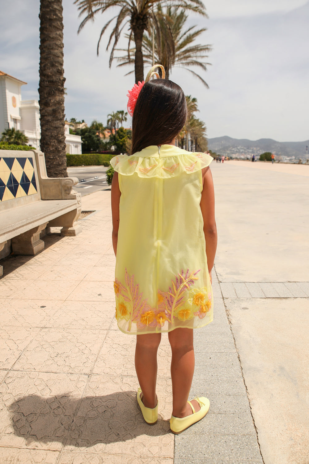 Yellow organza dress with hand appliqué of embellished pink palms, flowers and birds