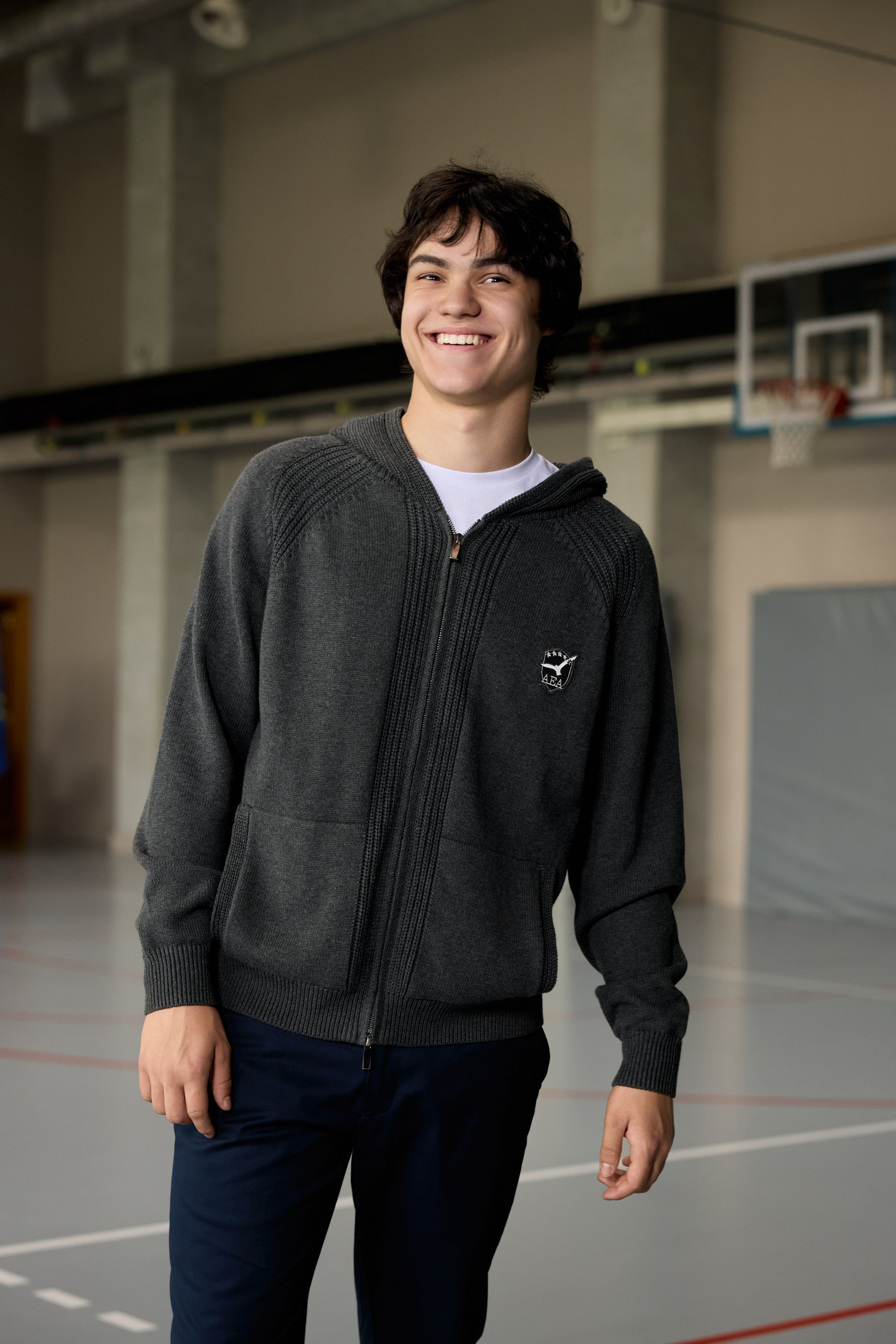 Grey zip-up hoodie for teen boys with ribbed texture