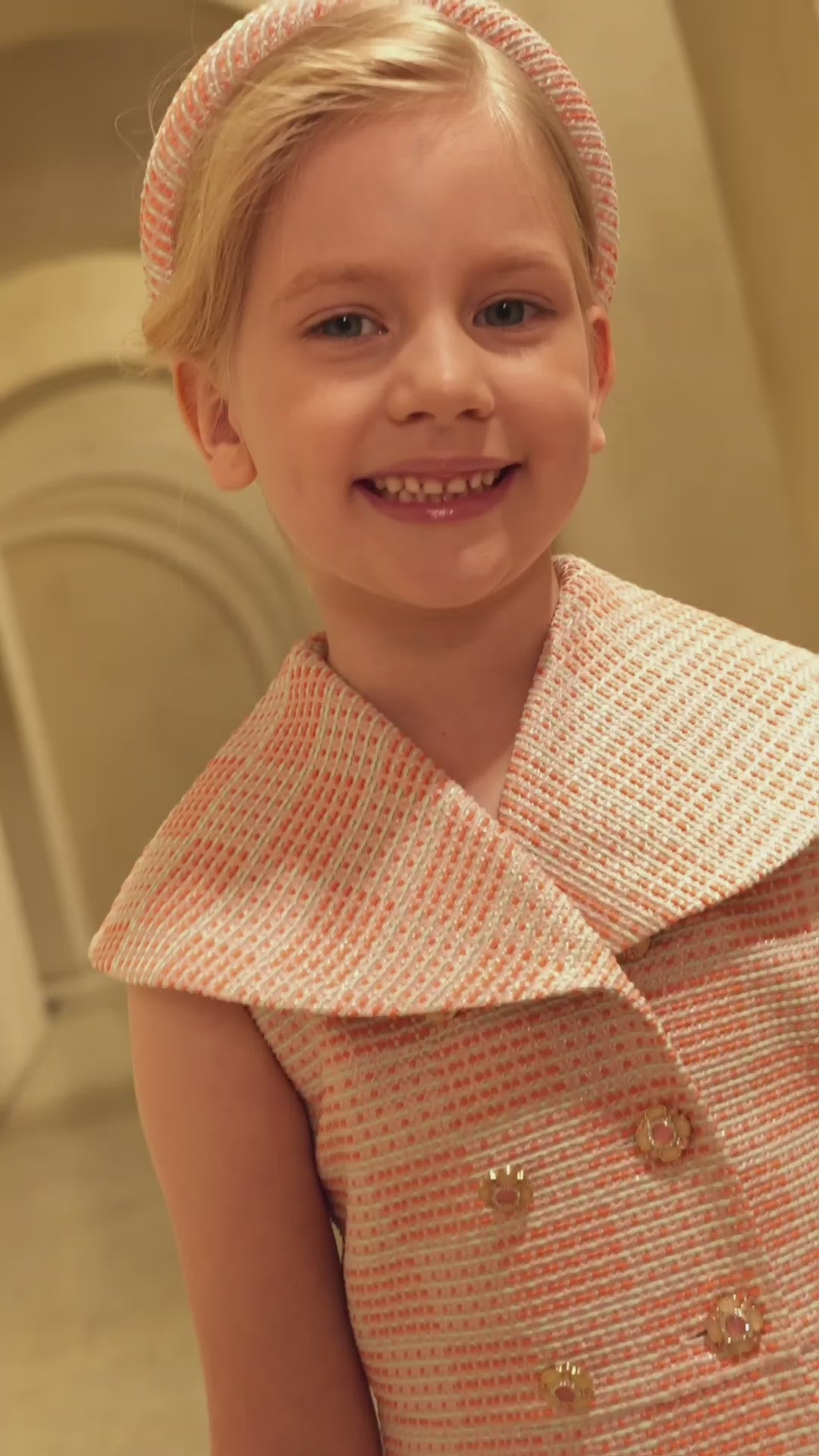 Sleeveless A-line dress in coral, aqua and rose gold tweed with a wide