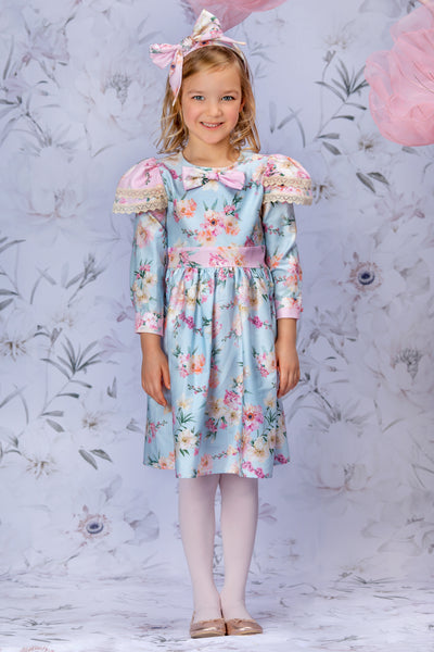 Blue cotton printed floral dress with long sleeves and a bow
