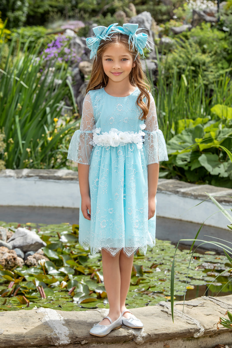 Baby blue and silver lace dress with white flower