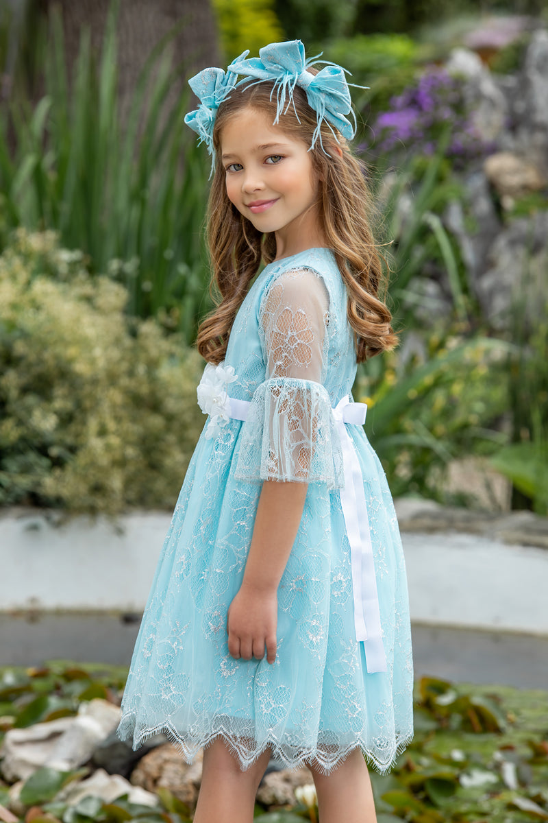 Baby blue and silver lace dress with white flower