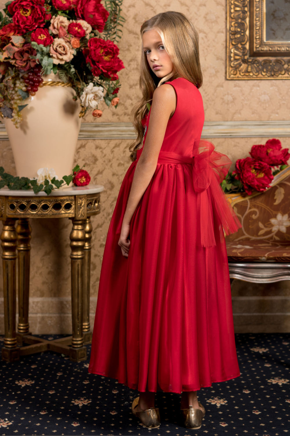 Red tulle dress with handmade embroidery and bow on the waist