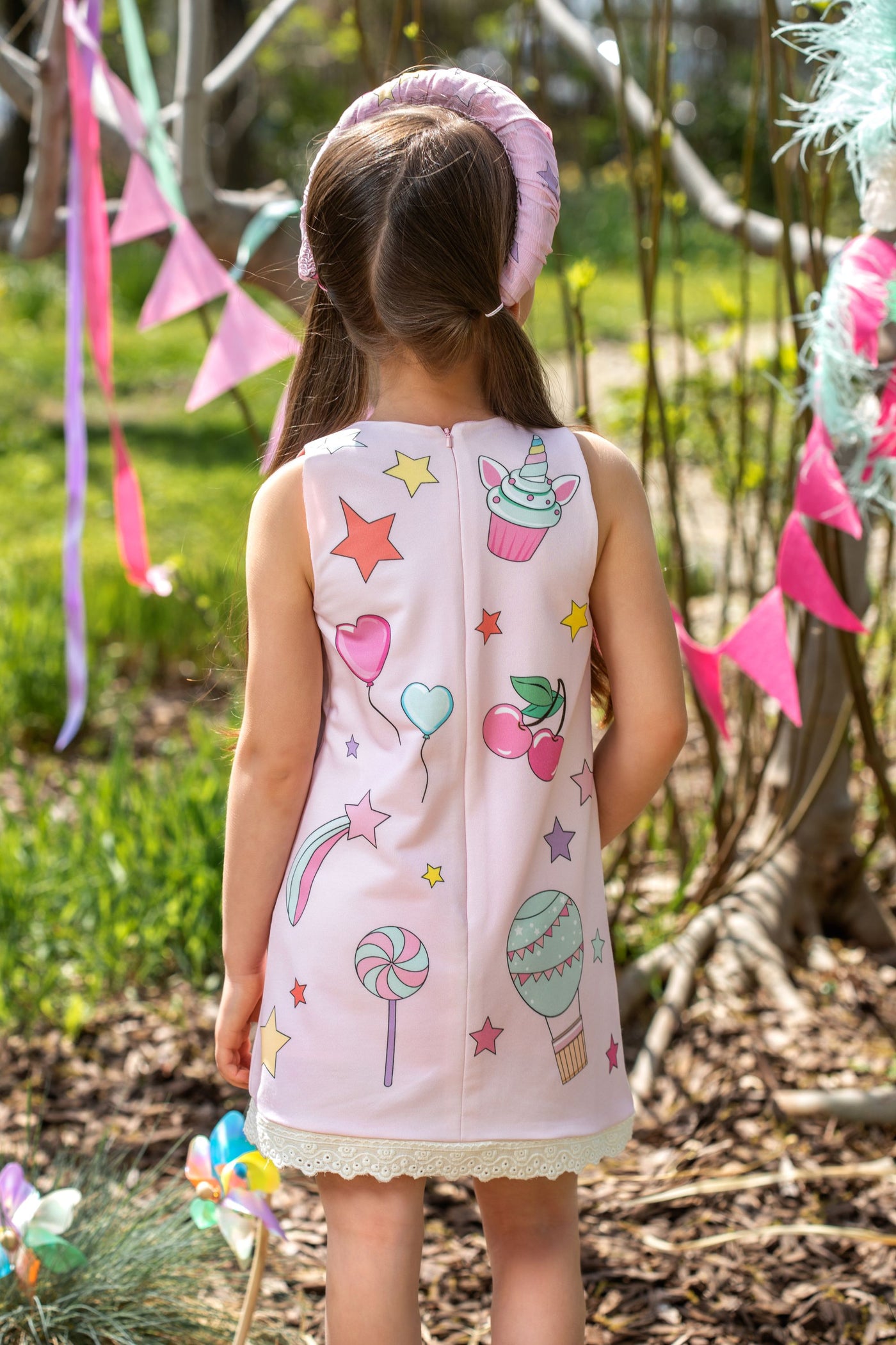 Pink jersey tunic dress with unicorn and hand-embellishments