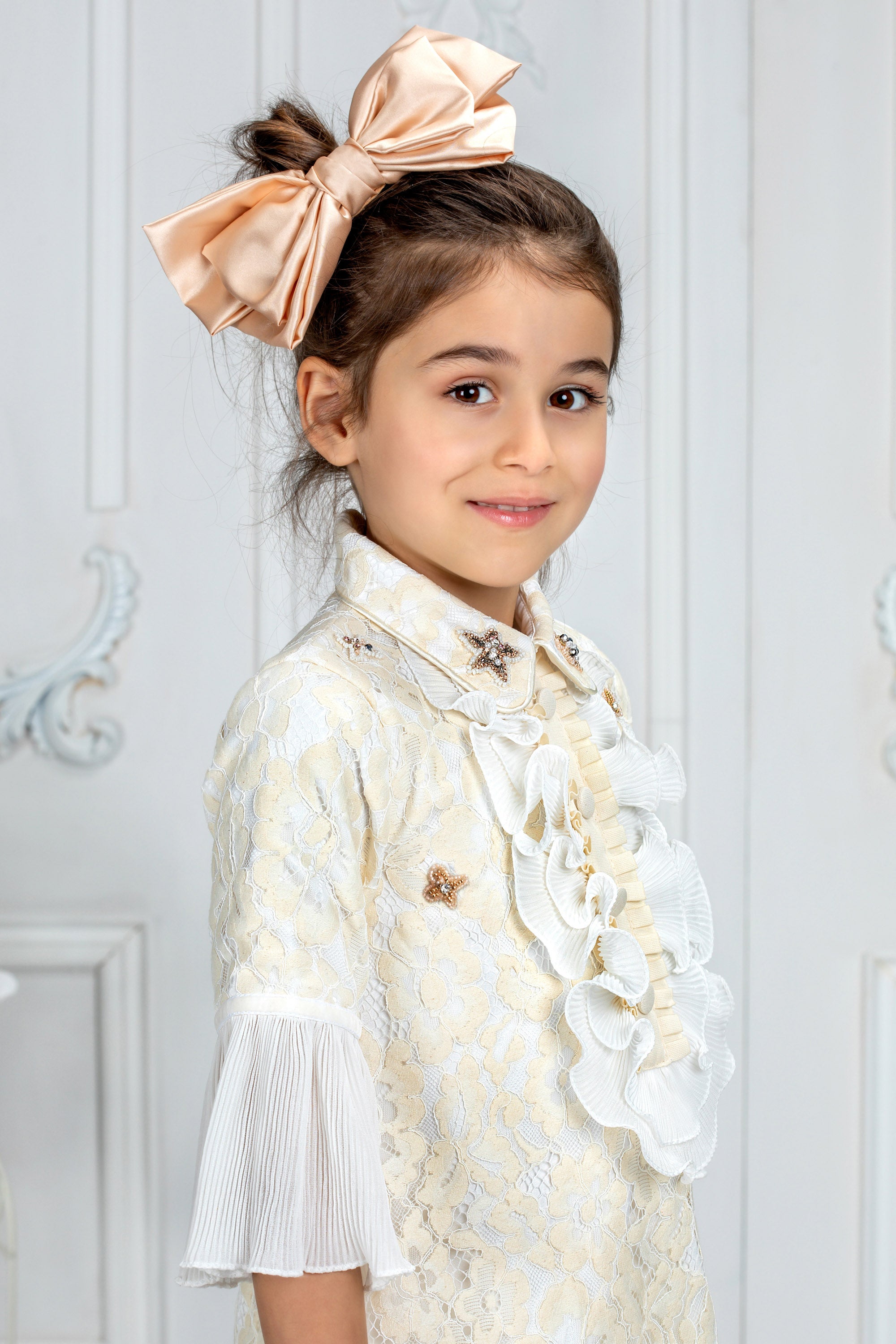 Off-white lace dress with chiffon sleeves and stars embroideries