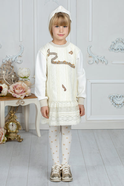 Ivory lace dress with handmade musical notes embellishments