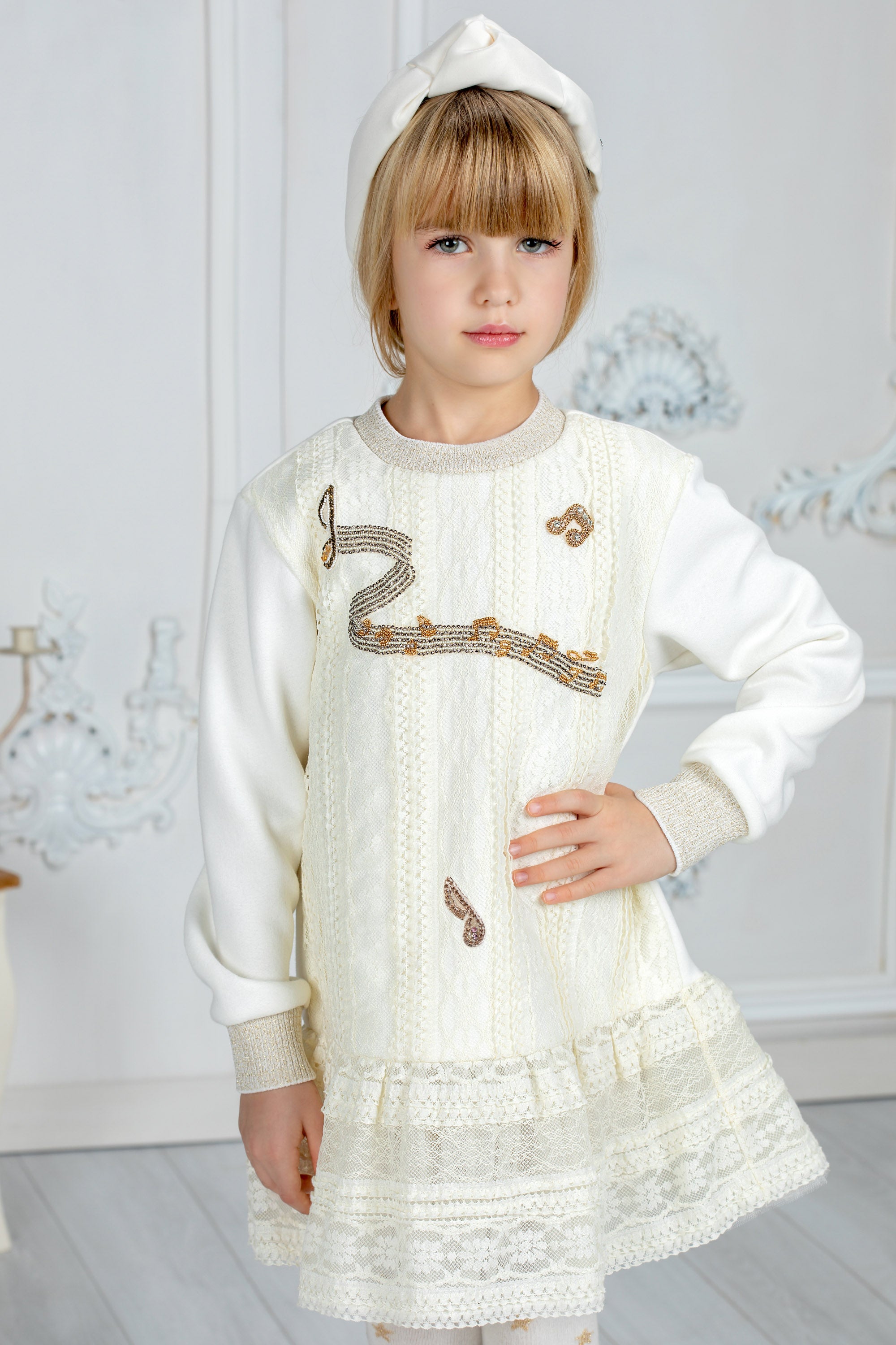 Ivory lace dress with handmade musical notes embellishments