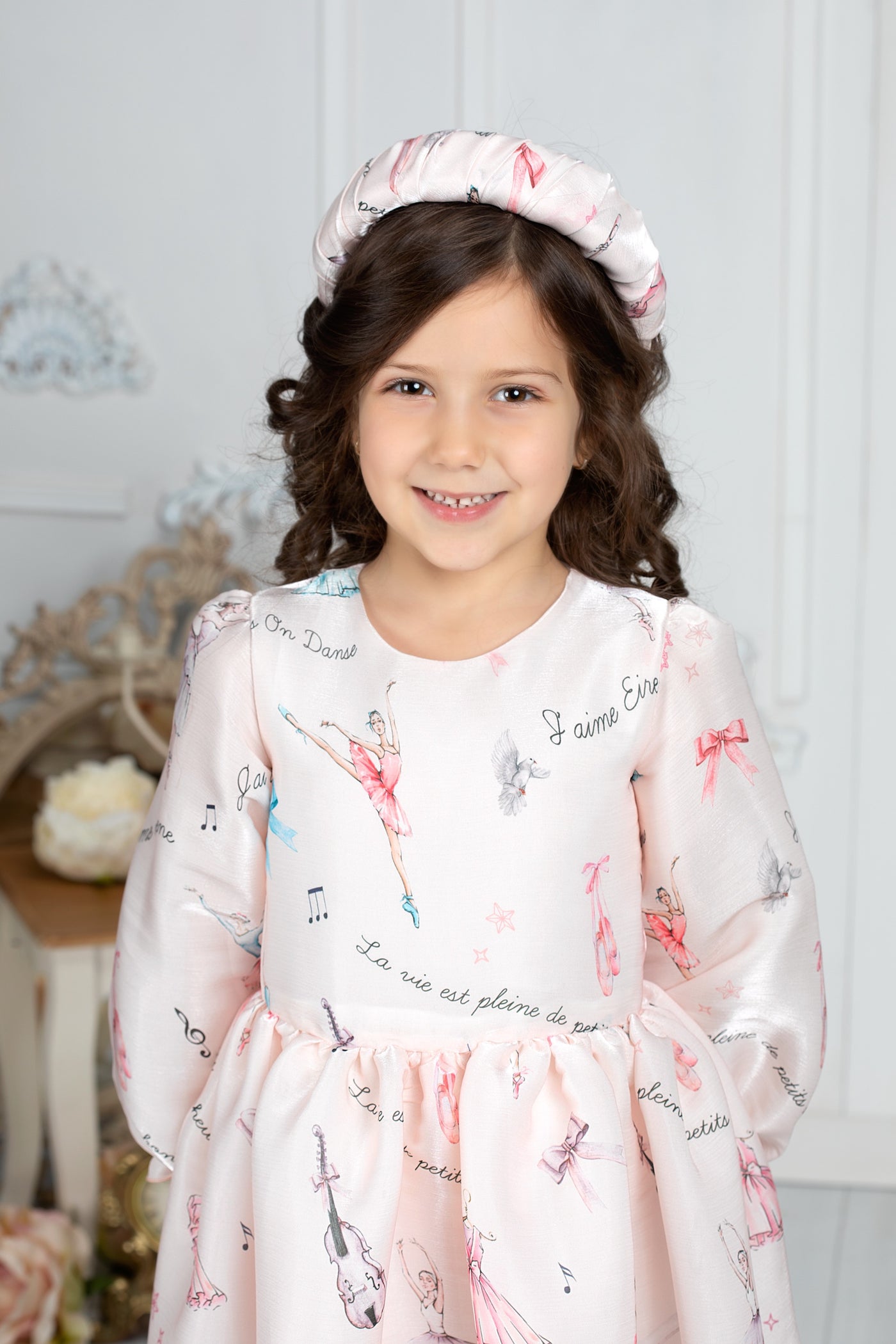 Silky ivory dress with ballet print and long sleeves