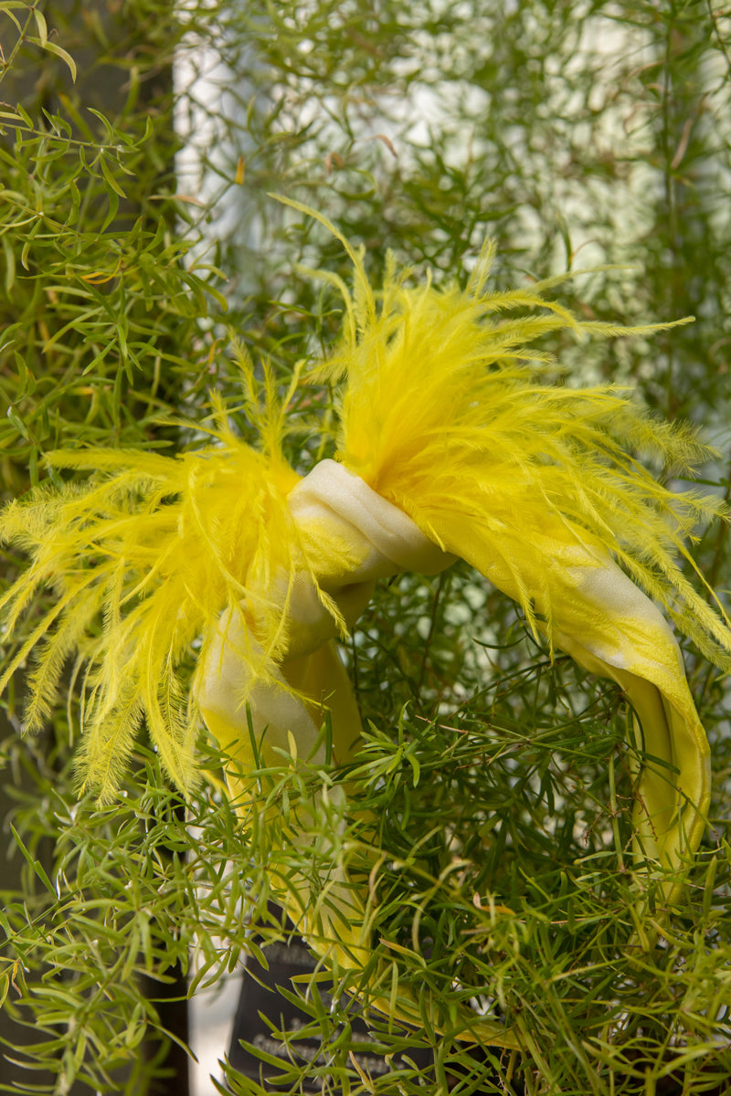 Yellow organza headband with feathers