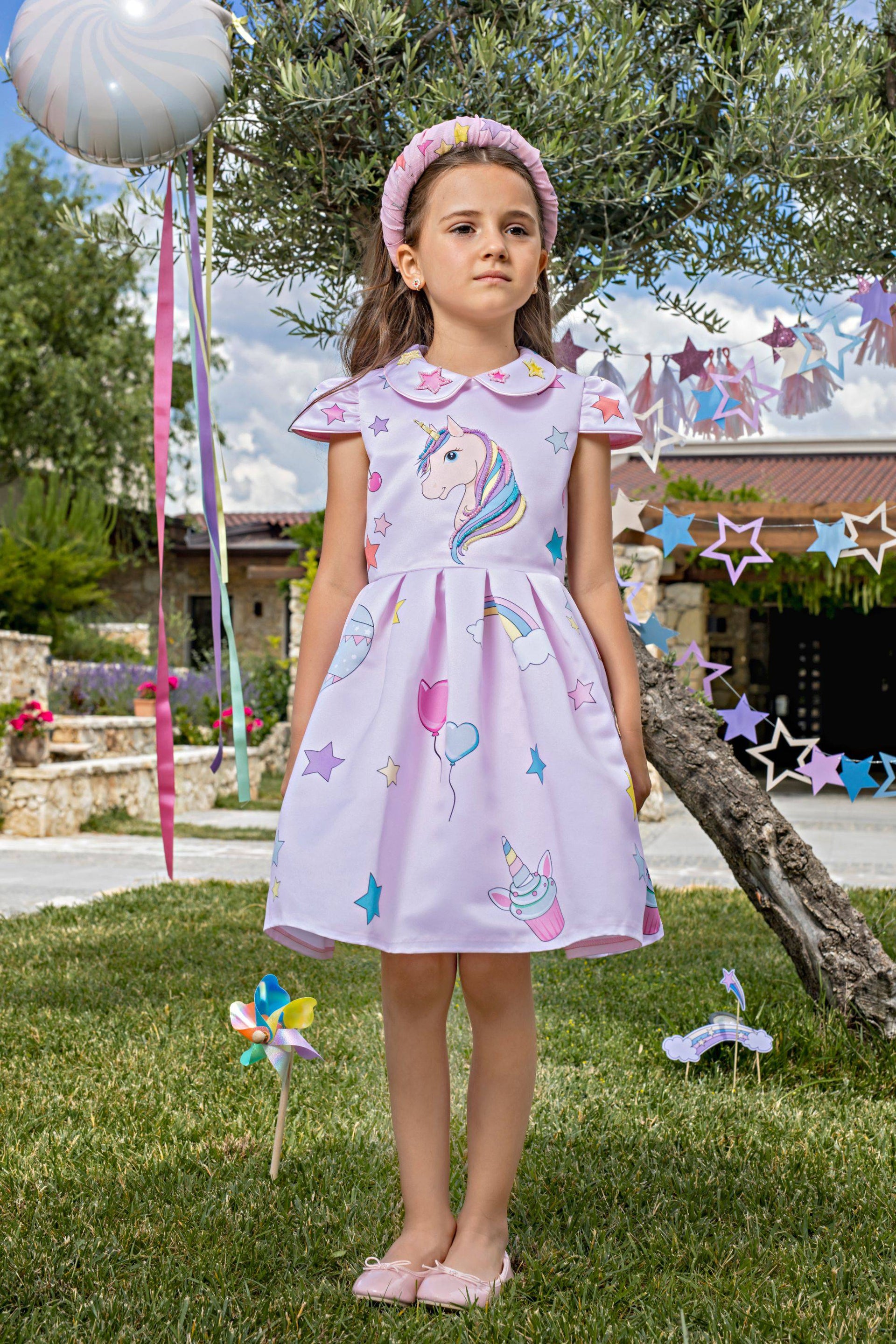 Pale pink unicorn dress with collar and hand-embellishments Pale pink unicorn dress with collar and hand-embellishments