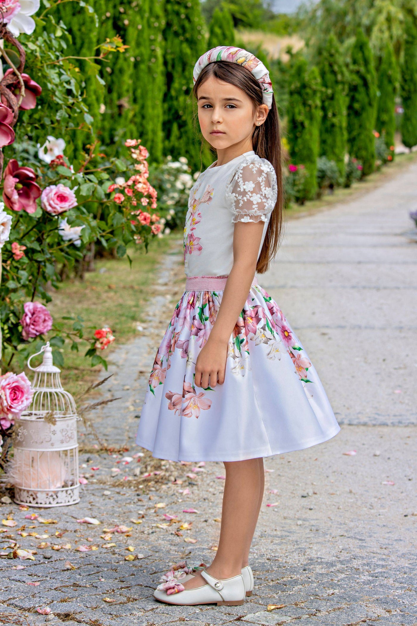 White satin floral skirt with pink elastic belt