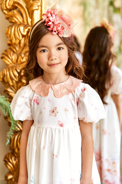 White satin cotton floral dress with puffed sleeves and embroidered collar